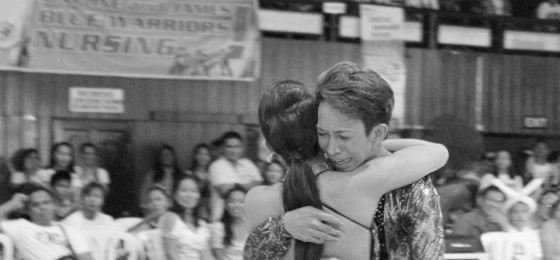 in Tears. Christian Amada, a student from the College of Business Administration, hugs his dance partner Mary Joy Ganaganag after being proclaimed as the champion for dance sport Latin Category last Dec. 6 at the Silliman University PHOTO BY Nelly Dableo